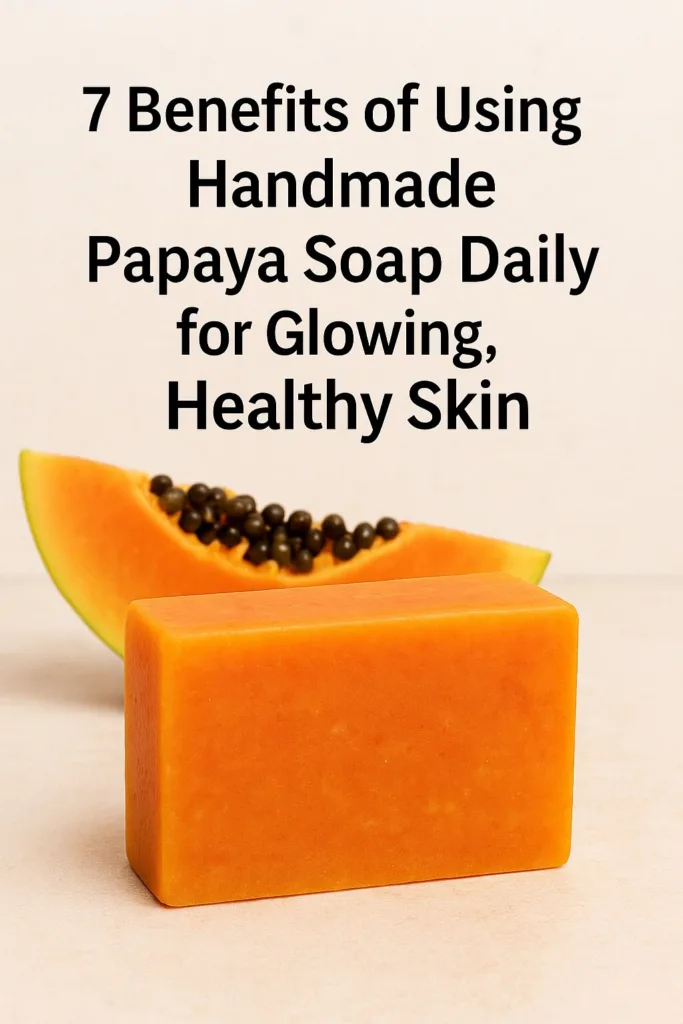 Handmade papaya soap bar displayed with fresh papaya and natural skincare ingredients on a wooden background