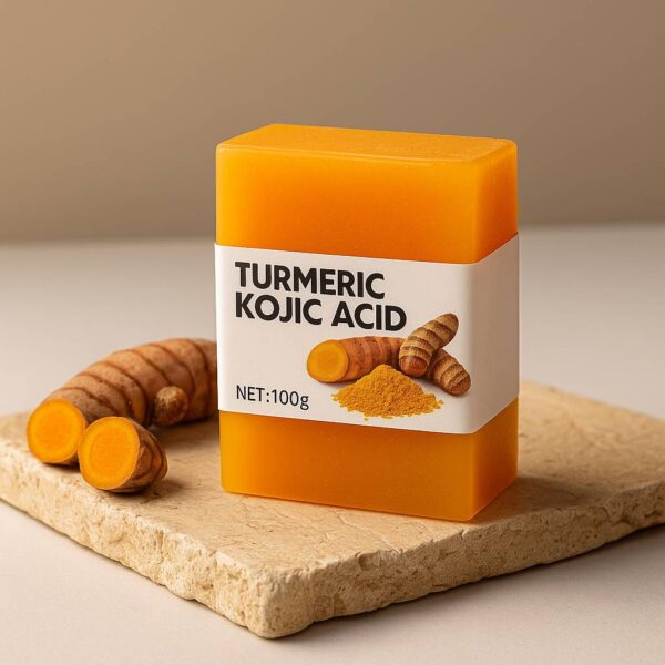 Yellow turmeric soap on wooden tray with spa accessories