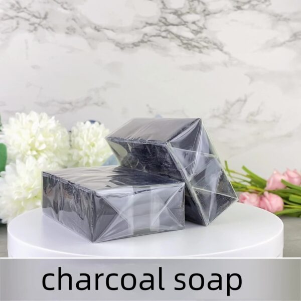 Wrapped charcoal soap bars with clear packaging, emphasizing clean presentation for retail or gifting